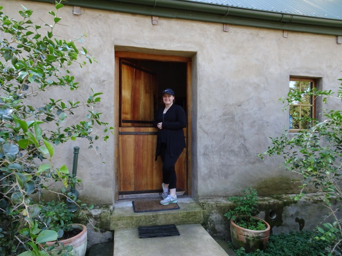 Me in front of the cottage- here you can see the size of the Dutch door a little better