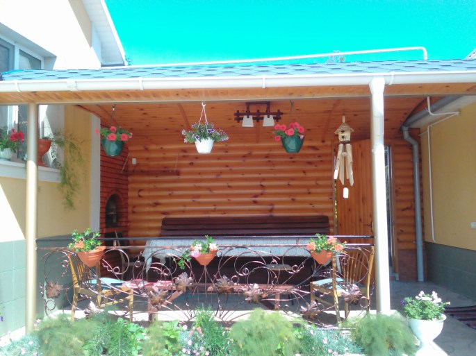 Our outdoor dining area- the main house is to the left and the summer kitchen is to the right
