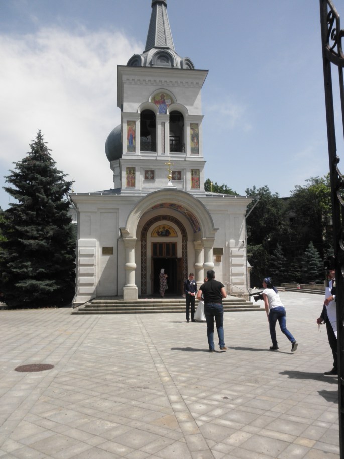 Photos in front of the church