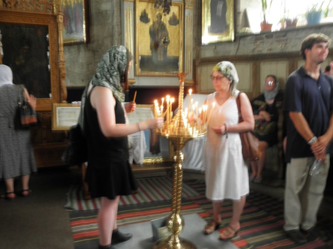 Lighting of candles at Sfantul Nicolae Monastry