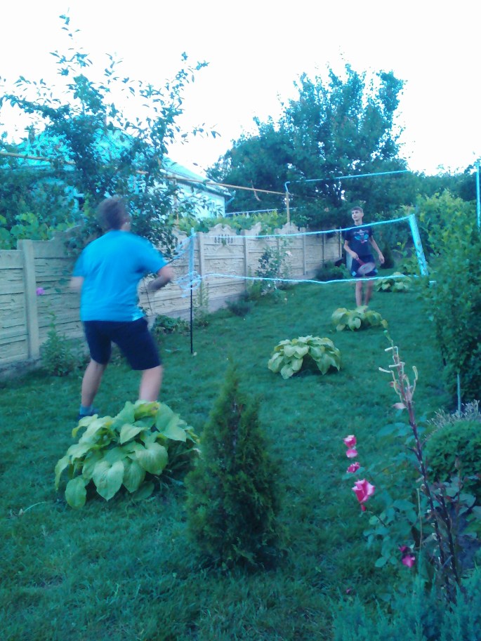 My host brother and host cousin playing badminton.