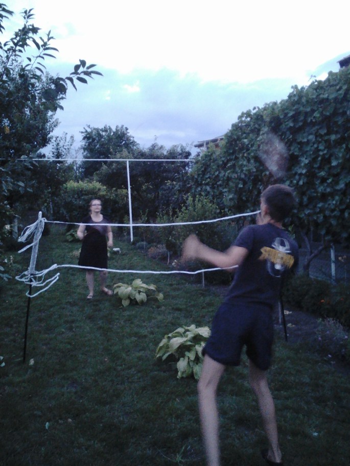 Playing badminton against my host cousin.  I lost, and still owe him and my host brother 10 pushups.